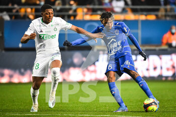 2021-11-21 - Zaydou YOUSSOUF of Saint Etienne and Rominigue KOUAME of ESTAC Troyes during the French championship Ligue 1 football match between ESTAC Troyes and AS Saint-Etienne on November 21, 2021 at Stade de l'Aube in Troyes, France - ESTAC TROYES VS AS SAINT-ETIENNE - FRENCH LIGUE 1 - SOCCER