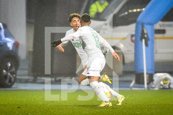 2021-11-21 - Miguel TRAUCO of Saint Etienne celebrate his goal with Adil AOUCHICHE of Saint Etienne during the French championship Ligue 1 football match between ESTAC Troyes and AS Saint-Etienne on November 21, 2021 at Stade de l'Aube in Troyes, France - ESTAC TROYES VS AS SAINT-ETIENNE - FRENCH LIGUE 1 - SOCCER