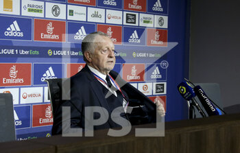 2021-11-21 - President of Olympique Lyonnais Jean-Michel Aulas answers to the media during a press conference after the match was stopped after few minutes when Dimitri Payet of OM received a plastic water bottle on the head thrown from the OL kop during the French championship Ligue 1 football match between Olympique Lyonnais (OL) and Olympique de Marseille (OM) on November 21, 2021 at Groupama stadium in Decines-Charpieu near Lyon, France - OLYMPIQUE LYONNAIS (OL) VS OLYMPIQUE DE MARSEILLE (OM) - FRENCH LIGUE 1 - SOCCER