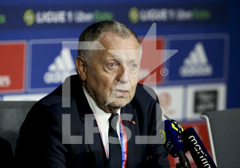 2021-11-21 - President of Olympique Lyonnais Jean-Michel Aulas answers to the media during a press conference after the match was stopped after few minutes when Dimitri Payet of OM received a plastic water bottle on the head thrown from the OL kop during the French championship Ligue 1 football match between Olympique Lyonnais (OL) and Olympique de Marseille (OM) on November 21, 2021 at Groupama stadium in Decines-Charpieu near Lyon, France - OLYMPIQUE LYONNAIS (OL) VS OLYMPIQUE DE MARSEILLE (OM) - FRENCH LIGUE 1 - SOCCER