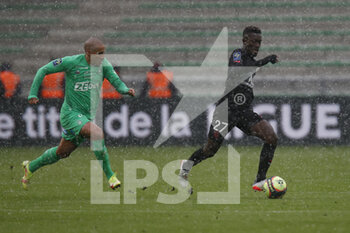 2021-11-28 - Idrissa GUEYE of Paris and Wahbi KHAZRI of Saint Etienne during the French championship Ligue 1 football match between AS Saint-Etienne and Paris Saint-Germain on November 28, 2021 at Geoffroy Guichard stadium in Saint-Etienne, France - AS SAINT-ETIENNE (ASSE) VS PARIS SAINT-GERMAIN (PSG) - FRENCH LIGUE 1 - SOCCER