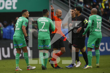 2021-11-28 - Referee Jerome BRISARD red card Thimothée KOLODZIEJCZAK of Saint Etienne and Ryad BOUDEBOUZ of Saint Etienne during the French championship Ligue 1 football match between AS Saint-Etienne and Paris Saint-Germain on November 28, 2021 at Geoffroy Guichard stadium in Saint-Etienne, France - AS SAINT-ETIENNE (ASSE) VS PARIS SAINT-GERMAIN (PSG) - FRENCH LIGUE 1 - SOCCER