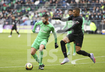 2021-11-28 - Ryad Boudebouz of Saint-Etienne, Kylian Mbappe of PSG during the French championship Ligue 1 football match between AS Saint-Etienne (ASSE) and Paris Saint-Germain (PSG) on November 28, 2021 at Stade Geoffroy Guichard in Saint-Etienne, France - AS SAINT-ETIENNE (ASSE) VS PARIS SAINT-GERMAIN (PSG) - FRENCH LIGUE 1 - SOCCER