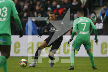 2021-11-28 - Kylian MBAPPE of Paris and Ryad BOUDEBOUZ of Saint Etienne during the French championship Ligue 1 football match between AS Saint-Etienne and Paris Saint-Germain on November 28, 2021 at Geoffroy Guichard stadium in Saint-Etienne, France - AS SAINT-ETIENNE (ASSE) VS PARIS SAINT-GERMAIN (PSG) - FRENCH LIGUE 1 - SOCCER