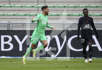 2021-11-28 - Denis Bouanga of Saint-Etienne celebrates his goal during the French championship Ligue 1 football match between AS Saint-Etienne (ASSE) and Paris Saint-Germain (PSG) on November 28, 2021 at Stade Geoffroy Guichard in Saint-Etienne, France - AS SAINT-ETIENNE (ASSE) VS PARIS SAINT-GERMAIN (PSG) - FRENCH LIGUE 1 - SOCCER