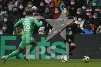 2021-11-28 - Juan BERNAT of Paris and Zaydou YOUSSOUF of Saint Etienne during the French championship Ligue 1 football match between AS Saint-Etienne and Paris Saint-Germain on November 28, 2021 at Geoffroy Guichard stadium in Saint-Etienne, France - AS SAINT-ETIENNE (ASSE) VS PARIS SAINT-GERMAIN (PSG) - FRENCH LIGUE 1 - SOCCER