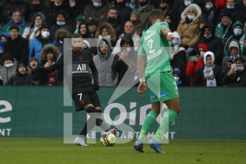 2021-11-28 - Kylian MBAPPE of Paris and Harold MOUKOUDI of Saint Etienne during the French championship Ligue 1 football match between AS Saint-Etienne and Paris Saint-Germain on November 28, 2021 at Geoffroy Guichard stadium in Saint-Etienne, France - AS SAINT-ETIENNE (ASSE) VS PARIS SAINT-GERMAIN (PSG) - FRENCH LIGUE 1 - SOCCER