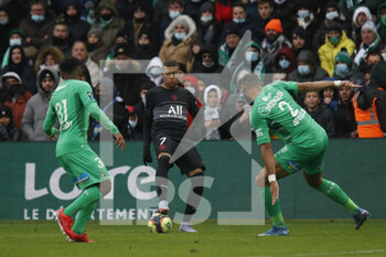 2021-11-28 - Kylian MBAPPE of Paris and Harold MOUKOUDI of Saint Etienne and Lucas CALODAT of Saint Etienne during the French championship Ligue 1 football match between AS Saint-Etienne and Paris Saint-Germain on November 28, 2021 at Geoffroy Guichard stadium in Saint-Etienne, France - AS SAINT-ETIENNE (ASSE) VS PARIS SAINT-GERMAIN (PSG) - FRENCH LIGUE 1 - SOCCER