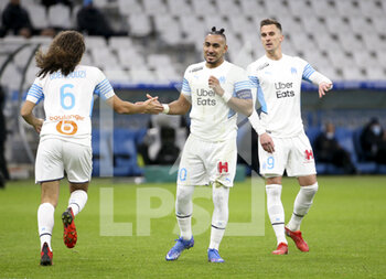 2021-11-28 - Dimitri Payet of Marseille between Matteo Guendouzi, Arkadiusz Milik during the French championship Ligue 1 football match between Olympique de Marseille and ESTAC Troyes on November 28, 2021 at Orange Velodrome stadium in Marseille, France - OLYMPIQUE DE MARSEILLE VS ESTAC TROYES - FRENCH LIGUE 1 - SOCCER