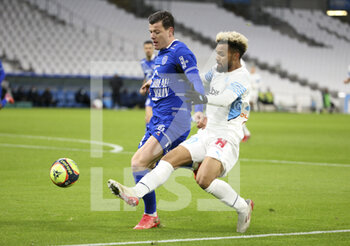 2021-11-28 - Giulian Biancone of Troyes, Konrad De La Fuente of Marseille during the French championship Ligue 1 football match between Olympique de Marseille and ESTAC Troyes on November 28, 2021 at Orange Velodrome stadium in Marseille, France - OLYMPIQUE DE MARSEILLE VS ESTAC TROYES - FRENCH LIGUE 1 - SOCCER