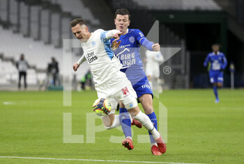 2021-11-28 - Arkadiusz Milik of Marseille, Giulian Biancone of Troyes during the French championship Ligue 1 football match between Olympique de Marseille and ESTAC Troyes on November 28, 2021 at Orange Velodrome stadium in Marseille, France - OLYMPIQUE DE MARSEILLE VS ESTAC TROYES - FRENCH LIGUE 1 - SOCCER