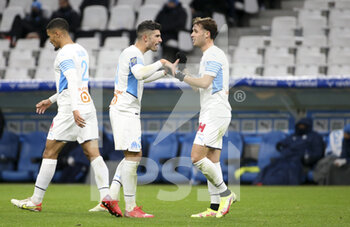 2021-11-28 - Pol Lirola of Marseille celebrates his goal with Alvaro Gonzalez (left) during the French championship Ligue 1 football match between Olympique de Marseille and ESTAC Troyes on November 28, 2021 at Orange Velodrome stadium in Marseille, France - OLYMPIQUE DE MARSEILLE VS ESTAC TROYES - FRENCH LIGUE 1 - SOCCER