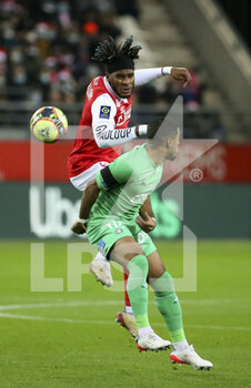2021-12-11 - Andreaw Gravillon of Reims, Arnaud Nordin of Saint-Etienne during the French championship Ligue 1 football match between Stade de Reims and AS Saint-Etienne (ASSE) on December 11, 2021 at Stade Auguste Delaune in Reims, France - STADE DE REIMS VS AS SAINT-ETIENNE (ASSE) - FRENCH LIGUE 1 - SOCCER