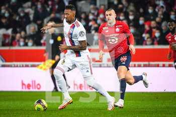 2021-12-12 - Jerome BOATENG of Lyon and Burak YILMAZ of Lille during the French championship Ligue 1 football match between LOSC Lille and Olympique Lyonnais (Lyon) on December 12, 2021 at Pierre Mauroy stadium in Villeneuve-d'Ascq near Lille, France - LOSC LILLE VS OLYMPIQUE LYONNAIS (LYON) - FRENCH LIGUE 1 - SOCCER