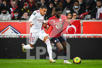 2021-12-12 - Malo GUSTO of Lyon and Jonathan BAMBA of Lille during the French championship Ligue 1 football match between LOSC Lille and Olympique Lyonnais (Lyon) on December 12, 2021 at Pierre Mauroy stadium in Villeneuve-d'Ascq near Lille, France - LOSC LILLE VS OLYMPIQUE LYONNAIS (LYON) - FRENCH LIGUE 1 - SOCCER
