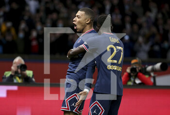 2021-12-12 - Kylian Mbappe of PSG celebrates his goal with Idrissa Gueye Gana during the French championship Ligue 1 football match between Paris Saint-Germain (PSG) and AS Monaco (ASM) on December 12, 2021 at Parc des Princes stadium in Paris, France - PARIS SAINT-GERMAIN VS AS MONACO - FRENCH LIGUE 1 - SOCCER