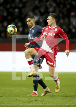 2021-12-12 - Aleksandr Golovin of Monaco, Achraf Hakimi of PSG (left) during the French championship Ligue 1 football match between Paris Saint-Germain (PSG) and AS Monaco (ASM) on December 12, 2021 at Parc des Princes stadium in Paris, France - PARIS SAINT-GERMAIN VS AS MONACO - FRENCH LIGUE 1 - SOCCER