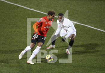 2021-12-22 - Armand Lauriente of Lorient, Georginio Wijnaldum of PSG during the French championship Ligue 1 football match between Fc Lorient (FCL) and Paris Saint-Germain (PSG) on December 22, 2021 at Stade du Moustoir in Lorient, France - FC LORIENT (FCL) VS PARIS SAINT-GERMAIN (PSG) - FRENCH LIGUE 1 - SOCCER