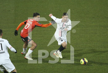 2021-12-22 - Lionel Messi of PSG, Enzo Le Fee of Lorient (left) during the French championship Ligue 1 football match between Fc Lorient (FCL) and Paris Saint-Germain (PSG) on December 22, 2021 at Stade du Moustoir in Lorient, France - FC LORIENT (FCL) VS PARIS SAINT-GERMAIN (PSG) - FRENCH LIGUE 1 - SOCCER