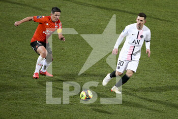 2021-12-22 - Laurent Abergel of Lorient, Lionel Messi of PSG during the French championship Ligue 1 football match between Fc Lorient (FCL) and Paris Saint-Germain (PSG) on December 22, 2021 at Stade du Moustoir in Lorient, France - FC LORIENT (FCL) VS PARIS SAINT-GERMAIN (PSG) - FRENCH LIGUE 1 - SOCCER
