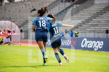 2021-08-28 - Coumba Sow of Paris FC celebrates the goal of Clara Mateo of Paris FC during the Women's French championship Arkema football match between Paris FC and EA Guingamp on August 28, 2021 at Robert Bobin stadium in Bondoufle, France - Photo Melanie Laurent / A2M Sport Consulting / DPPI - PARIS FC VS EA GUINGAMP - FRENCH WOMEN DIVISION 1 - SOCCER