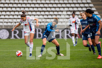 2021-12-12 - Delphine Cascarino of Olympique Lyonnais and Sophie Vaysse of Paris FC fight for the ball during the Women's French championship D1 Arkema football match between Paris FC and Olympique Lyonnais on December 12, 2021 at Charlety stadium in Paris, France - PARIS FC VS OLYMPIQUE LYONNAIS - FRENCH WOMEN DIVISION 1 - SOCCER