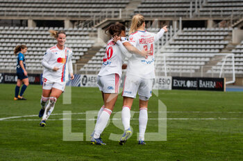2021-12-12 - Delphine Cascarino of Olympique Lyonnais and Ada Hegerberg of Olympique Lyonnais celebrate the goal during the Women's French championship D1 Arkema football match between Paris FC and Olympique Lyonnais on December 12, 2021 at Charlety stadium in Paris, France - PARIS FC VS OLYMPIQUE LYONNAIS - FRENCH WOMEN DIVISION 1 - SOCCER