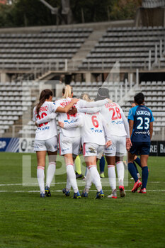2021-12-12 - Ada Hegerberg of Olympique Lyonnais celebrates with teammates after scoring during the Women's French championship D1 Arkema football match between Paris FC and Olympique Lyonnais on December 12, 2021 at Charlety stadium in Paris, France - PARIS FC VS OLYMPIQUE LYONNAIS - FRENCH WOMEN DIVISION 1 - SOCCER