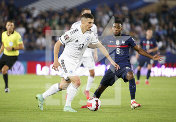 2021-09-01 - Gojko Cimirot of Bosnia and Herzegovina, Thomas Lemar of France during the FIFA World Cup Qatar 2022, Qualifiers, Group D football match between France and Bosnia and Herzegovina on September 1, 2021 at Stade de La Meinau in Strasbourg, France - FIFA WORLD CUP QATAR 2022, QUALIFIERS, GROUP D - FRANCE AND BOSNIA AND HERZEGOVINA - FIFA WORLD CUP - SOCCER