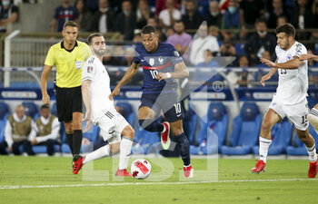 2021-09-01 - Kylian Mbappe of France, Miralem Pjanic of Bosnia and Herzegovina (left) during the FIFA World Cup Qatar 2022, Qualifiers, Group D football match between France and Bosnia and Herzegovina on September 1, 2021 at Stade de La Meinau in Strasbourg, France - Photo Jean Catuffe / DPPI - FIFA WORLD CUP QATAR 2022, QUALIFIERS, GROUP D - FRANCE AND BOSNIA AND HERZEGOVINA - FIFA WORLD CUP - SOCCER