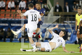 2021-09-01 - Kylian Mbappe of France, Anel Ahmedhodzic of Bosnia and Herzegovina during the FIFA World Cup Qatar 2022, Qualifiers, Group D football match between France and Bosnia and Herzegovina on September 1, 2021 at Stade de La Meinau in Strasbourg, France - Photo Jean Catuffe / DPPI - FIFA WORLD CUP QATAR 2022, QUALIFIERS, GROUP D - FRANCE AND BOSNIA AND HERZEGOVINA - FIFA WORLD CUP - SOCCER