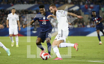2021-09-01 - Kingsley Coman of France, Stipe Loncar of Bosnia and Herzegovina during the FIFA World Cup Qatar 2022, Qualifiers, Group D football match between France and Bosnia and Herzegovina on September 1, 2021 at Stade de La Meinau in Strasbourg, France - Photo Jean Catuffe / DPPI - FIFA WORLD CUP QATAR 2022, QUALIFIERS, GROUP D - FRANCE AND BOSNIA AND HERZEGOVINA - FIFA WORLD CUP - SOCCER