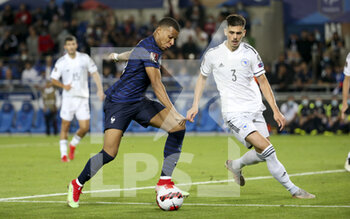 2021-09-01 - Kylian Mbappe of France, Dennis Hadzikadunic of Bosnia and Herzegovina during the FIFA World Cup Qatar 2022, Qualifiers, Group D football match between France and Bosnia and Herzegovina on September 1, 2021 at Stade de La Meinau in Strasbourg, France - Photo Jean Catuffe / DPPI - FIFA WORLD CUP QATAR 2022, QUALIFIERS, GROUP D - FRANCE AND BOSNIA AND HERZEGOVINA - FIFA WORLD CUP - SOCCER