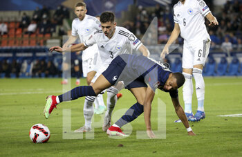 2021-09-01 - Kylian Mbappe of France, Dennis Hadzikadunic of Bosnia and Herzegovina during the FIFA World Cup Qatar 2022, Qualifiers, Group D football match between France and Bosnia and Herzegovina on September 1, 2021 at Stade de La Meinau in Strasbourg, France - FIFA WORLD CUP QATAR 2022, QUALIFIERS, GROUP D - FRANCE AND BOSNIA AND HERZEGOVINA - FIFA WORLD CUP - SOCCER