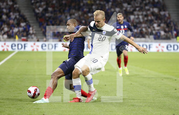 2021-09-07 - Presnel Kimpembe of France, Joel Pohjanpalo of Finland during the FIFA World Cup Qatar 2022, Qualifiers, Group D football match between France and Finland on September 7, 2021 at Groupama stadium in Decines-Charpieu near Lyon, France - FIFA WORLD CUP QATAR 2022, QUALIFIERS, GROUP D - FRANCE AND FINLAND - FIFA WORLD CUP - SOCCER