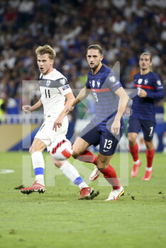 2021-09-07 - Rasmus Schuller of Finland, Adrien Rabiot of France during the FIFA World Cup Qatar 2022, Qualifiers, Group D football match between France and Finland on September 7, 2021 at Groupama stadium in Decines-Charpieu near Lyon, France - FIFA WORLD CUP QATAR 2022, QUALIFIERS, GROUP D - FRANCE AND FINLAND - FIFA WORLD CUP - SOCCER