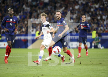 2021-09-07 - Rasmus Schuller of Finland, Adrien Rabiot of France during the FIFA World Cup Qatar 2022, Qualifiers, Group D football match between France and Finland on September 7, 2021 at Groupama stadium in Decines-Charpieu near Lyon, France - FIFA WORLD CUP QATAR 2022, QUALIFIERS, GROUP D - FRANCE AND FINLAND - FIFA WORLD CUP - SOCCER