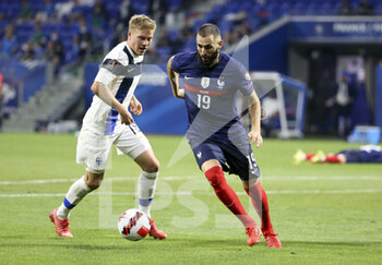 2021-09-07 - Jere Uronen of Finland, Karim Benzema of France during the FIFA World Cup Qatar 2022, Qualifiers, Group D football match between France and Finland on September 7, 2021 at Groupama stadium in Decines-Charpieu near Lyon, France - FIFA WORLD CUP QATAR 2022, QUALIFIERS, GROUP D - FRANCE AND FINLAND - FIFA WORLD CUP - SOCCER