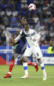 2021-09-07 - Glen Kamara of Finland, Paul Pogba of France during the FIFA World Cup Qatar 2022, Qualifiers, Group D football match between France and Finland on September 7, 2021 at Groupama stadium in Decines-Charpieu near Lyon, France - FIFA WORLD CUP QATAR 2022, QUALIFIERS, GROUP D - FRANCE AND FINLAND - FIFA WORLD CUP - SOCCER