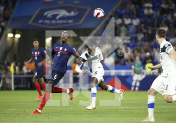 2021-09-07 - Paul Pogba of France, Glen Kamara of Finland during the FIFA World Cup Qatar 2022, Qualifiers, Group D football match between France and Finland on September 7, 2021 at Groupama stadium in Decines-Charpieu near Lyon, France - FIFA WORLD CUP QATAR 2022, QUALIFIERS, GROUP D - FRANCE AND FINLAND - FIFA WORLD CUP - SOCCER
