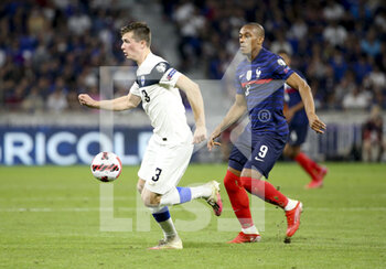2021-09-07 - Daniel O?Shaughnessy of Finland, Anthony Martial of France during the FIFA World Cup Qatar 2022, Qualifiers, Group D football match between France and Finland on September 7, 2021 at Groupama stadium in Decines-Charpieu near Lyon, France - FIFA WORLD CUP QATAR 2022, QUALIFIERS, GROUP D - FRANCE AND FINLAND - FIFA WORLD CUP - SOCCER