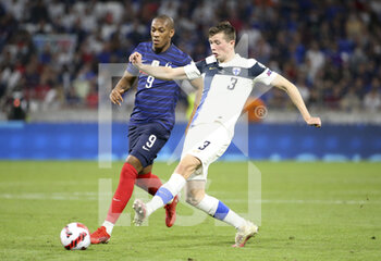2021-09-07 - Daniel O?Shaughnessy of Finland, Anthony Martial of France (left) during the FIFA World Cup Qatar 2022, Qualifiers, Group D football match between France and Finland on September 7, 2021 at Groupama stadium in Decines-Charpieu near Lyon, France - FIFA WORLD CUP QATAR 2022, QUALIFIERS, GROUP D - FRANCE AND FINLAND - FIFA WORLD CUP - SOCCER