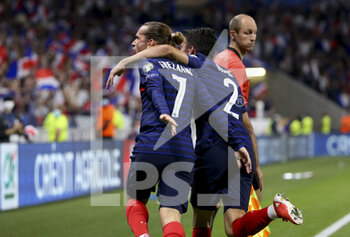 2021-09-07 - Antoine Griezmann of France celebrates his second goal during with Leo Dubois the FIFA World Cup Qatar 2022, Qualifiers, Group D football match between France and Finland on September 7, 2021 at Groupama stadium in Decines-Charpieu near Lyon, France - FIFA WORLD CUP QATAR 2022, QUALIFIERS, GROUP D - FRANCE AND FINLAND - FIFA WORLD CUP - SOCCER