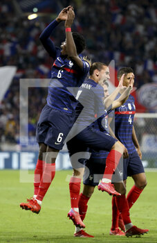 2021-09-07 - Antoine Griezmann of France celebrates his second goal with Paul Pogba (left) during the FIFA World Cup Qatar 2022, Qualifiers, Group D football match between France and Finland on September 7, 2021 at Groupama stadium in Decines-Charpieu near Lyon, France - FIFA WORLD CUP QATAR 2022, QUALIFIERS, GROUP D - FRANCE AND FINLAND - FIFA WORLD CUP - SOCCER