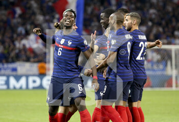 2021-09-07 - Paul Pogba of France and teammates celebrate the second goal of France during the FIFA World Cup Qatar 2022, Qualifiers, Group D football match between France and Finland on September 7, 2021 at Groupama stadium in Decines-Charpieu near Lyon, France - FIFA WORLD CUP QATAR 2022, QUALIFIERS, GROUP D - FRANCE AND FINLAND - FIFA WORLD CUP - SOCCER