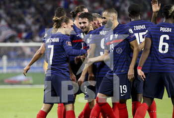 2021-09-07 - Antoine Griezmann of France celebrates his second goal with Karim Benzema during the FIFA World Cup Qatar 2022, Qualifiers, Group D football match between France and Finland on September 7, 2021 at Groupama stadium in Decines-Charpieu near Lyon, France - FIFA WORLD CUP QATAR 2022, QUALIFIERS, GROUP D - FRANCE AND FINLAND - FIFA WORLD CUP - SOCCER