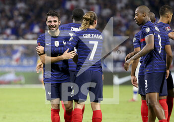 2021-09-07 - Antoine Griezmann of France celebrates his second goal with Leo Dubois (left) and Presnel Kimpembe during the FIFA World Cup Qatar 2022, Qualifiers, Group D football match between France and Finland on September 7, 2021 at Groupama stadium in Decines-Charpieu near Lyon, France - FIFA WORLD CUP QATAR 2022, QUALIFIERS, GROUP D - FRANCE AND FINLAND - FIFA WORLD CUP - SOCCER