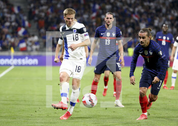 2021-09-07 - Jere Uronen of Finland, Antoine Griezmann of France during the FIFA World Cup Qatar 2022, Qualifiers, Group D football match between France and Finland on September 7, 2021 at Groupama stadium in Decines-Charpieu near Lyon, France - FIFA WORLD CUP QATAR 2022, QUALIFIERS, GROUP D - FRANCE AND FINLAND - FIFA WORLD CUP - SOCCER