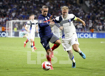 2021-09-07 - Antoine Griezmann of France, Paulus Arajuuri of Finland during the FIFA World Cup Qatar 2022, Qualifiers, Group D football match between France and Finland on September 7, 2021 at Groupama stadium in Decines-Charpieu near Lyon, France - FIFA WORLD CUP QATAR 2022, QUALIFIERS, GROUP D - FRANCE AND FINLAND - FIFA WORLD CUP - SOCCER