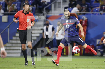 2021-09-07 - Karim Benzema of France, Referee Deniz Aytekin of Germany (left) during the FIFA World Cup Qatar 2022, Qualifiers, Group D football match between France and Finland on September 7, 2021 at Groupama stadium in Decines-Charpieu near Lyon, France - FIFA WORLD CUP QATAR 2022, QUALIFIERS, GROUP D - FRANCE AND FINLAND - FIFA WORLD CUP - SOCCER